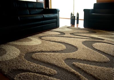 Synthetic machine-made carpet
